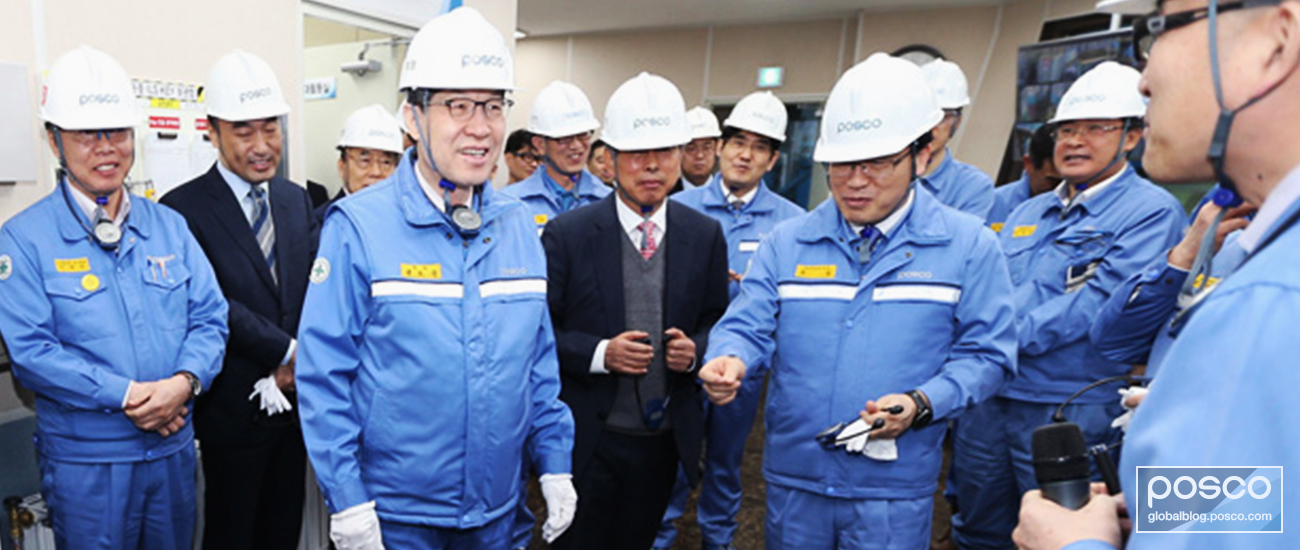 CEO Ohjoon Kwon and other officials gather around to celebrate the completion of the silicon steel capacity enhancement project. 