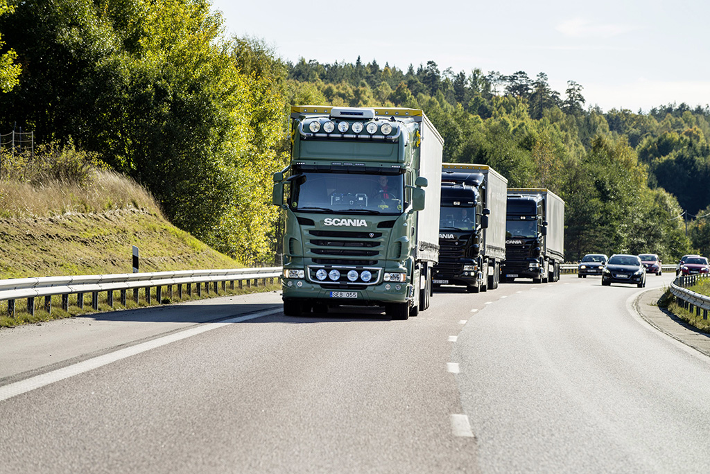 Volkswagen AG’s Scania brand trucks drive on the road