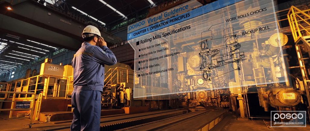 A worker looking at data in POSCO’s smart factory.
