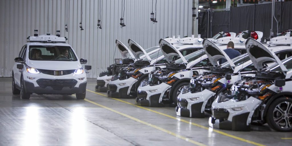 A fleet of GM Chevy Bolt EVs under inspection.