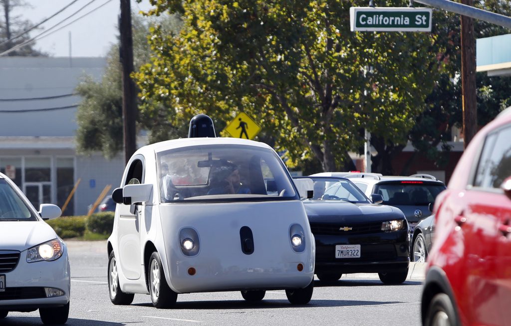 An electric, autonomous vehicle on California Street
