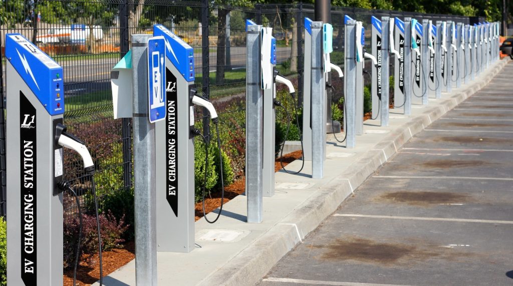 A row of electric vehicle chargers.