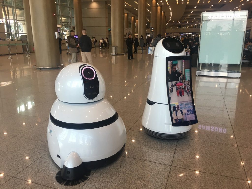 LG’s Airport Guide Robot and Airport Cleaning Robot.