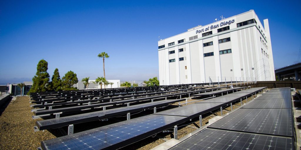 Solar panels behind the facilities of the global shipping Port of San Diego.